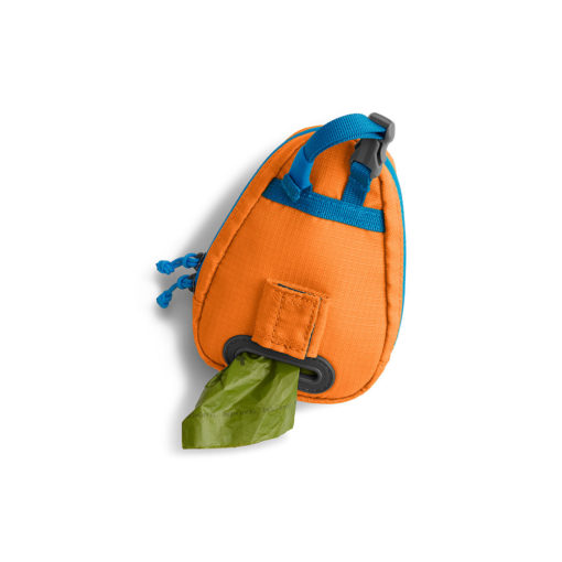 Showing bags dispensing from the Ruffwear Stash Bag™ pick-up bag / poo bag storage and dispensing system. Poppy Orange.
