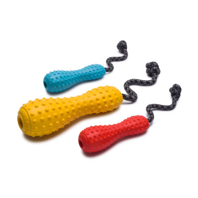 The Gourdo rubber dog toy with throw rope is designed for interactive play, from tugging to throwing. Shown in two sizes and three colours.
